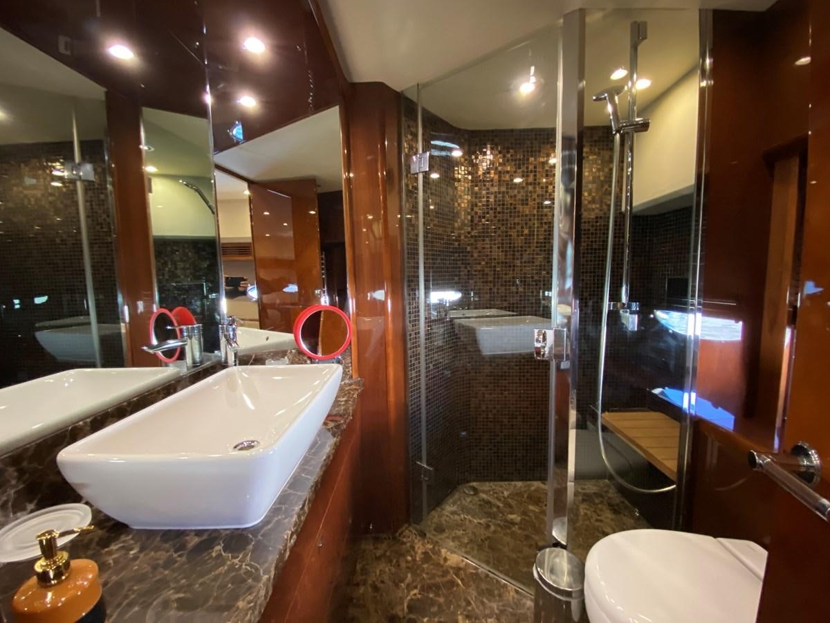 a bathroom with a large bathtub aboard 95 MY Yacht for Sale