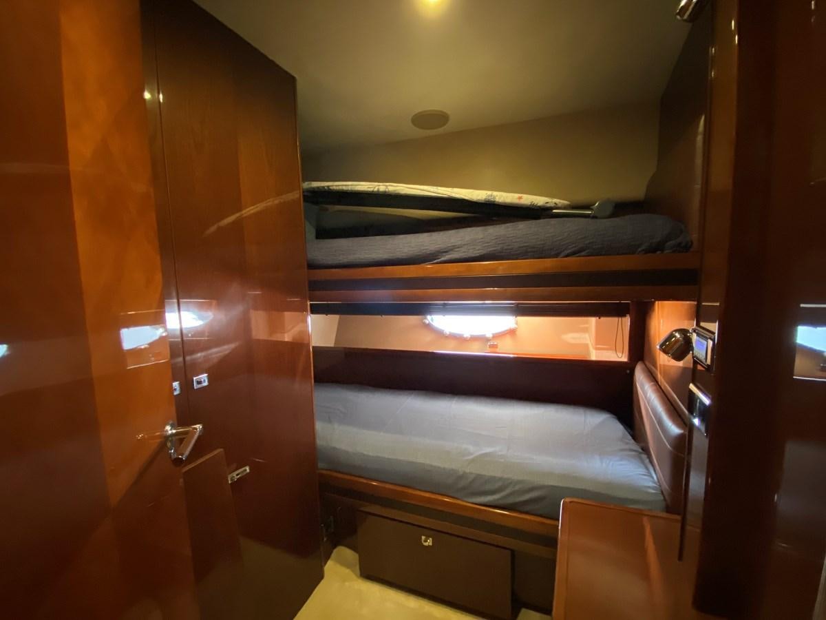 a bed in a room aboard 95 MY Yacht for Sale