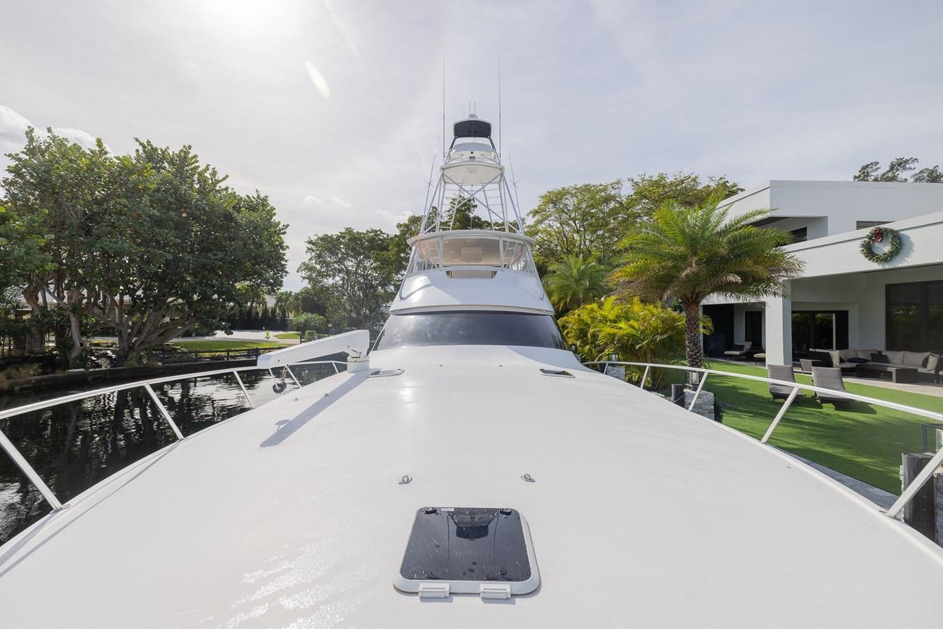 a white boat on a road aboard STABILIZED Yacht for Sale