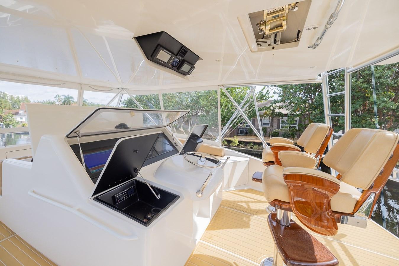 a room with a table and chairs aboard STABILIZED Yacht for Sale