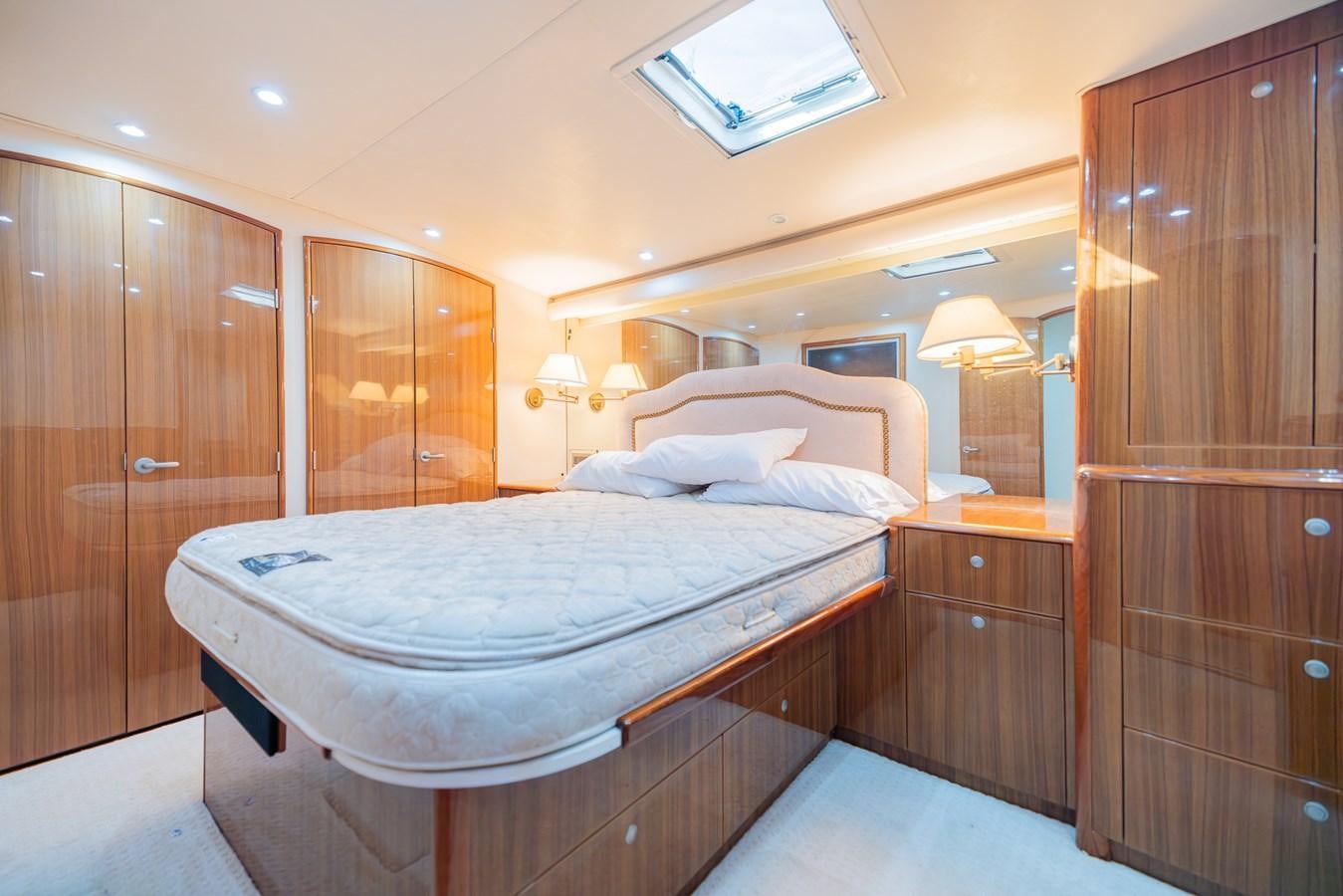a bed in a room aboard STABILIZED Yacht for Sale