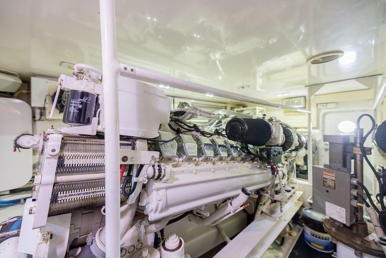 a large white machine with a large metal object on the side aboard STABILIZED Yacht for Sale