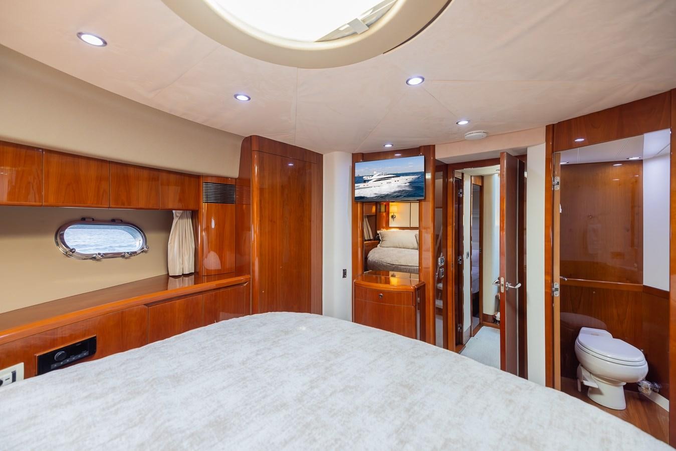 a large bedroom with a large bed aboard ODYSSEA Yacht for Sale