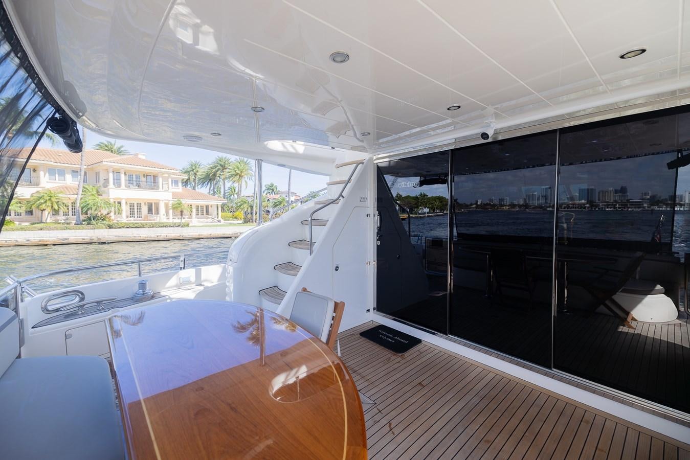 a room with a table and chairs aboard ODYSSEA Yacht for Sale