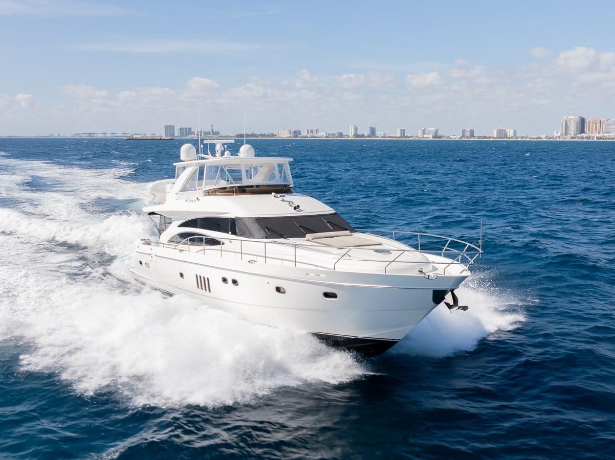 a white yacht on the water aboard ODYSSEA Yacht for Sale