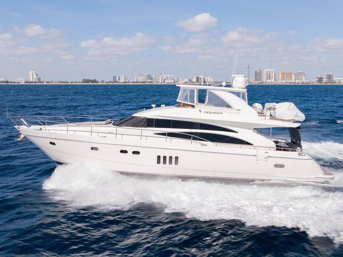 a white yacht in the water aboard ODYSSEA Yacht for Sale