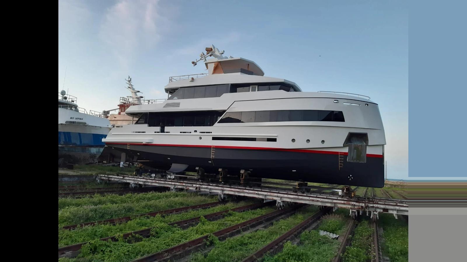 a white and red train on a track aboard 2024 INACE EXPLORA 115 Yacht for Sale