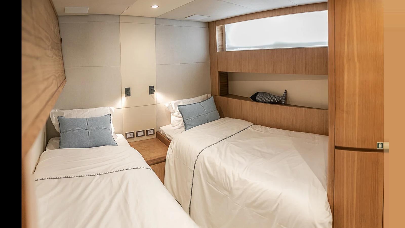 a room with two beds aboard 2024 INACE EXPLORA 115 Yacht for Sale