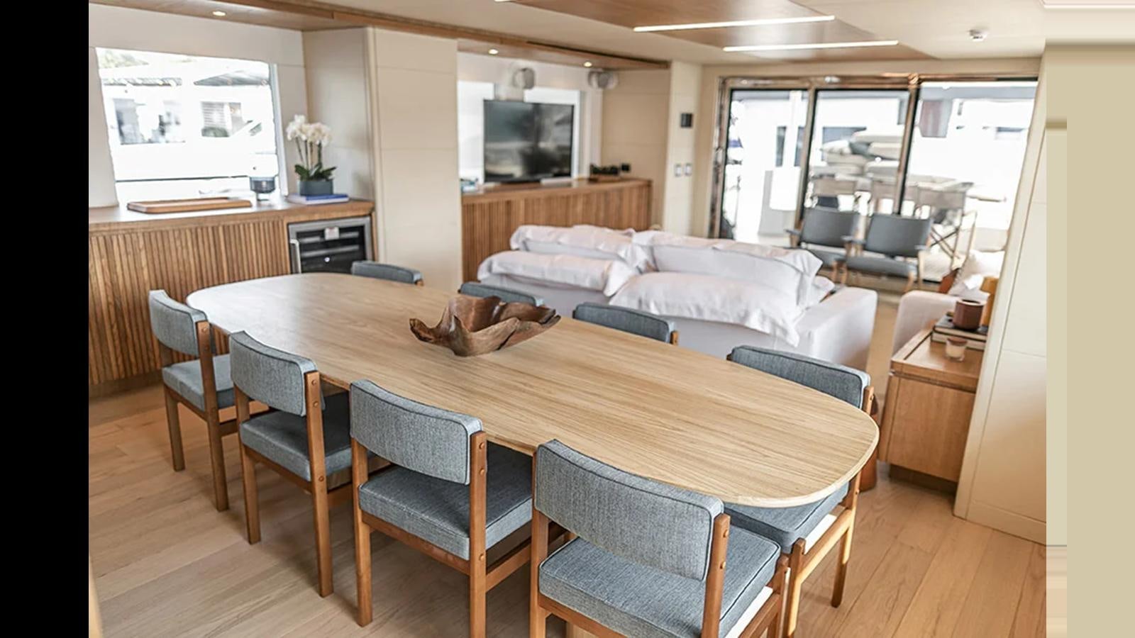 a large kitchen and dining room area aboard 2024 INACE EXPLORA 115 Yacht for Sale