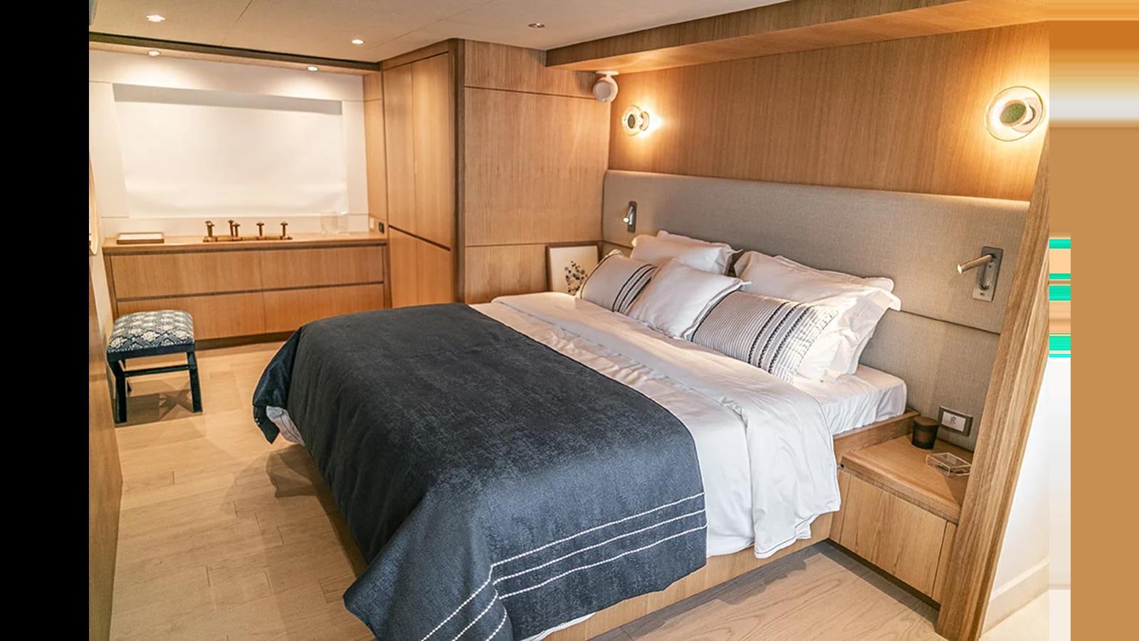 a bed with white sheets aboard 2024 INACE EXPLORA 115 Yacht for Sale