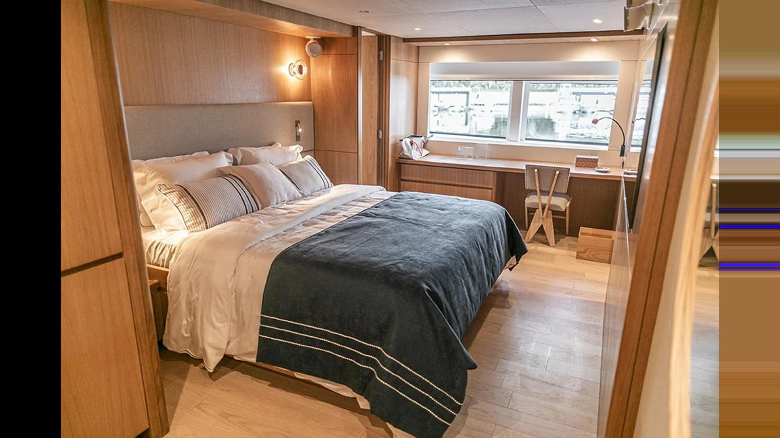 a bed in a room aboard 2024 INACE EXPLORA 115 Yacht for Sale