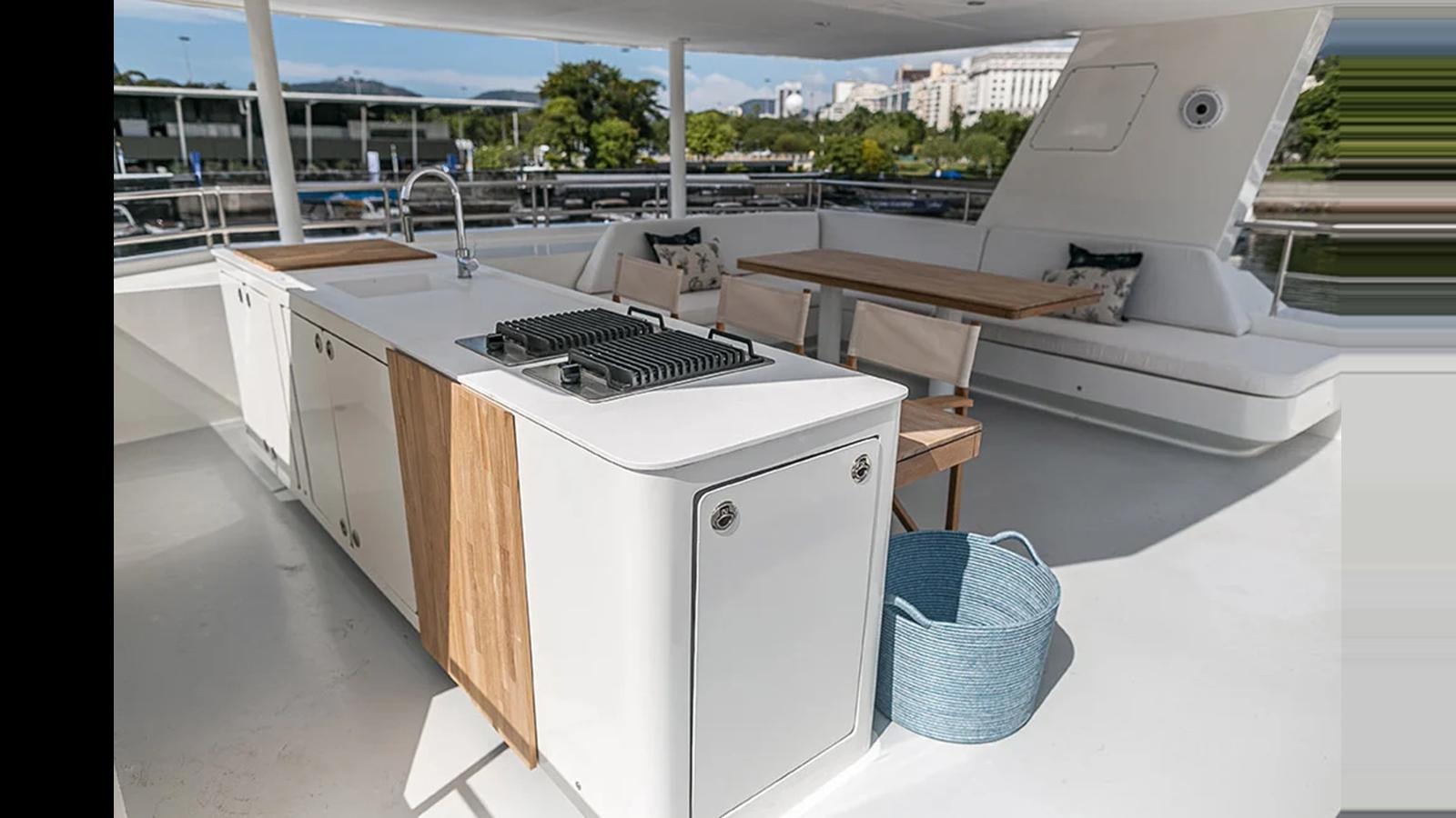 a white desk with a computer on it aboard 2024 INACE EXPLORA 115 Yacht for Sale