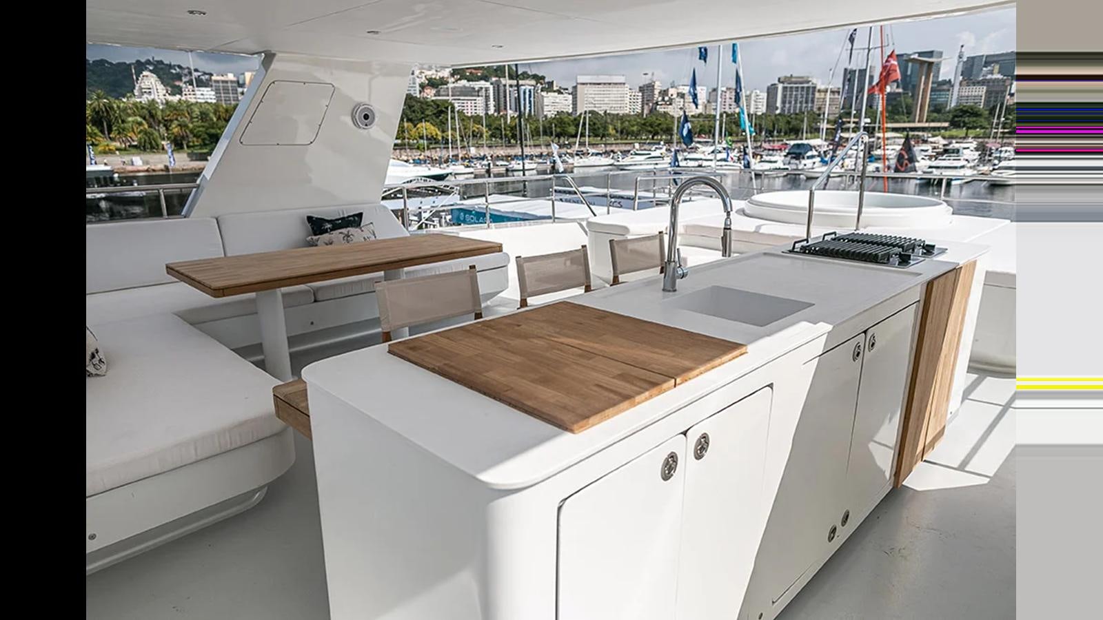 a room with a desk and a sink aboard 2024 INACE EXPLORA 115 Yacht for Sale