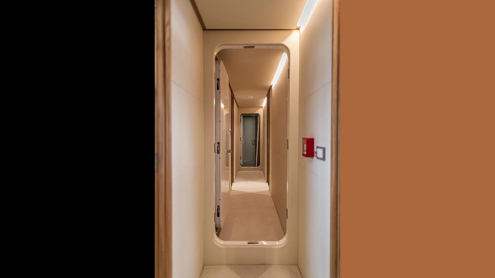 a hallway with a door aboard 2024 INACE EXPLORA 115 Yacht for Sale