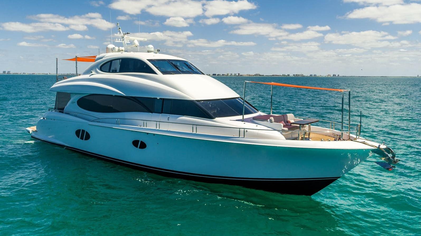 a white boat in the water aboard DADDY'S LADY Yacht for Sale