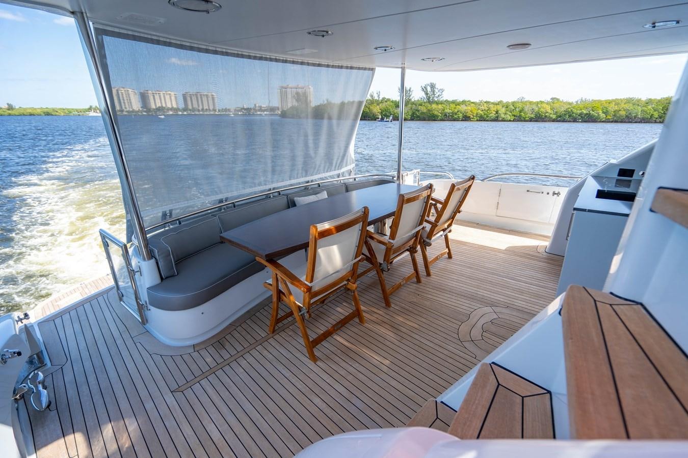 a boat with chairs on it aboard VOYAGER Yacht for Sale