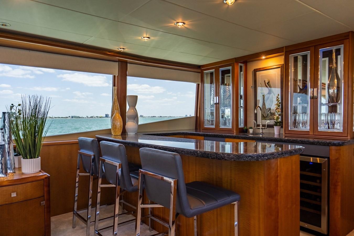 a large kitchen with a large window aboard VOYAGER Yacht for Sale