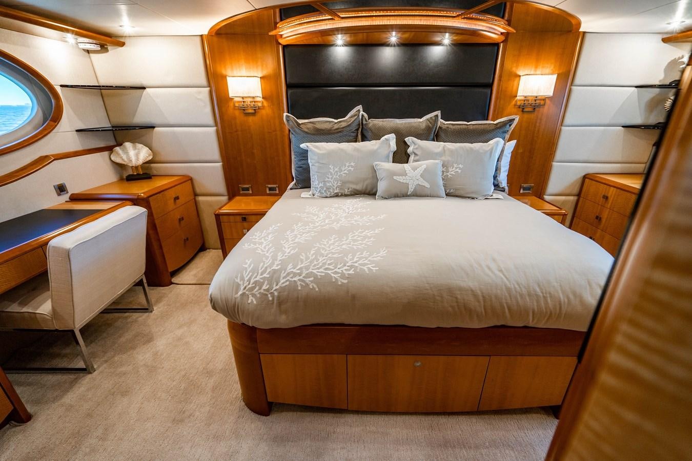 a bed in a room aboard VOYAGER Yacht for Sale