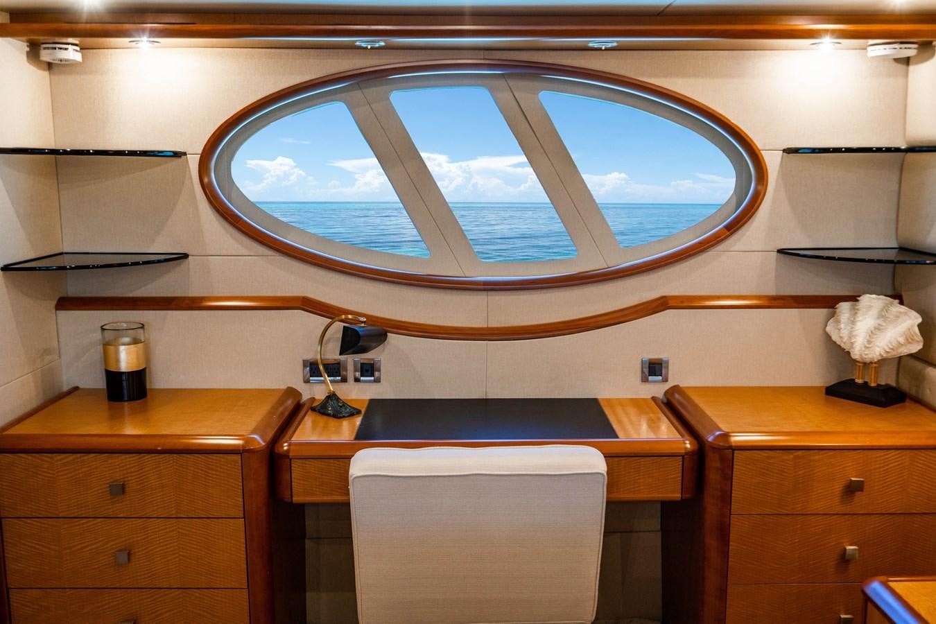 a room with a large window aboard VOYAGER Yacht for Sale