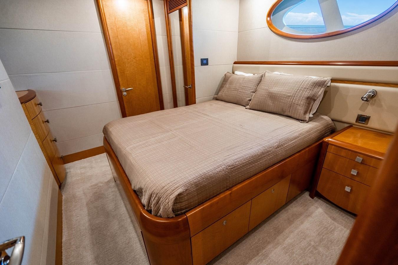 a bed in a room aboard VOYAGER Yacht for Sale