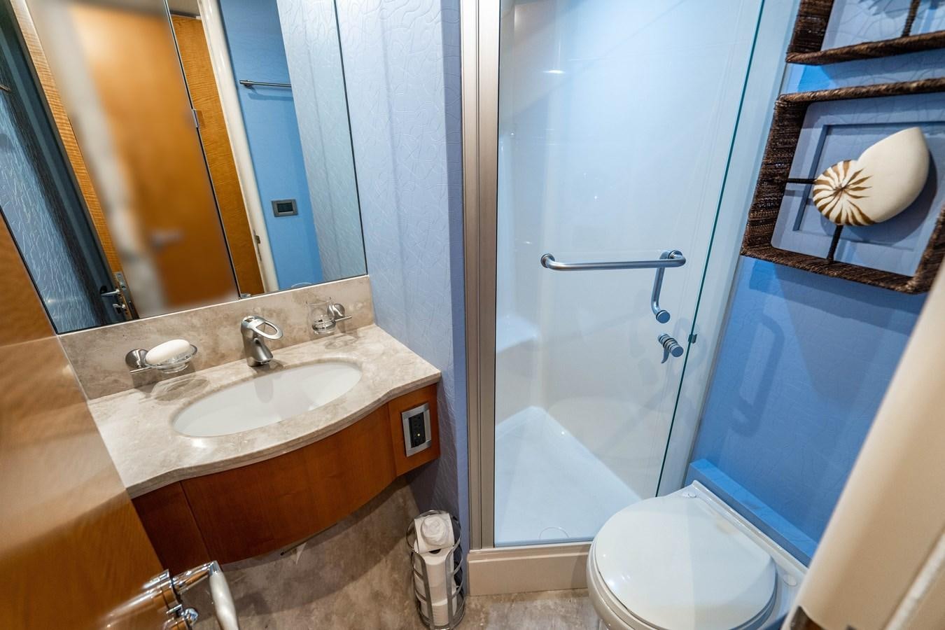 a bathroom with a sink and a toilet aboard VOYAGER Yacht for Sale