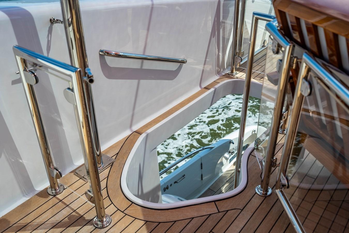 a glass shower with a glass door aboard VOYAGER Yacht for Sale