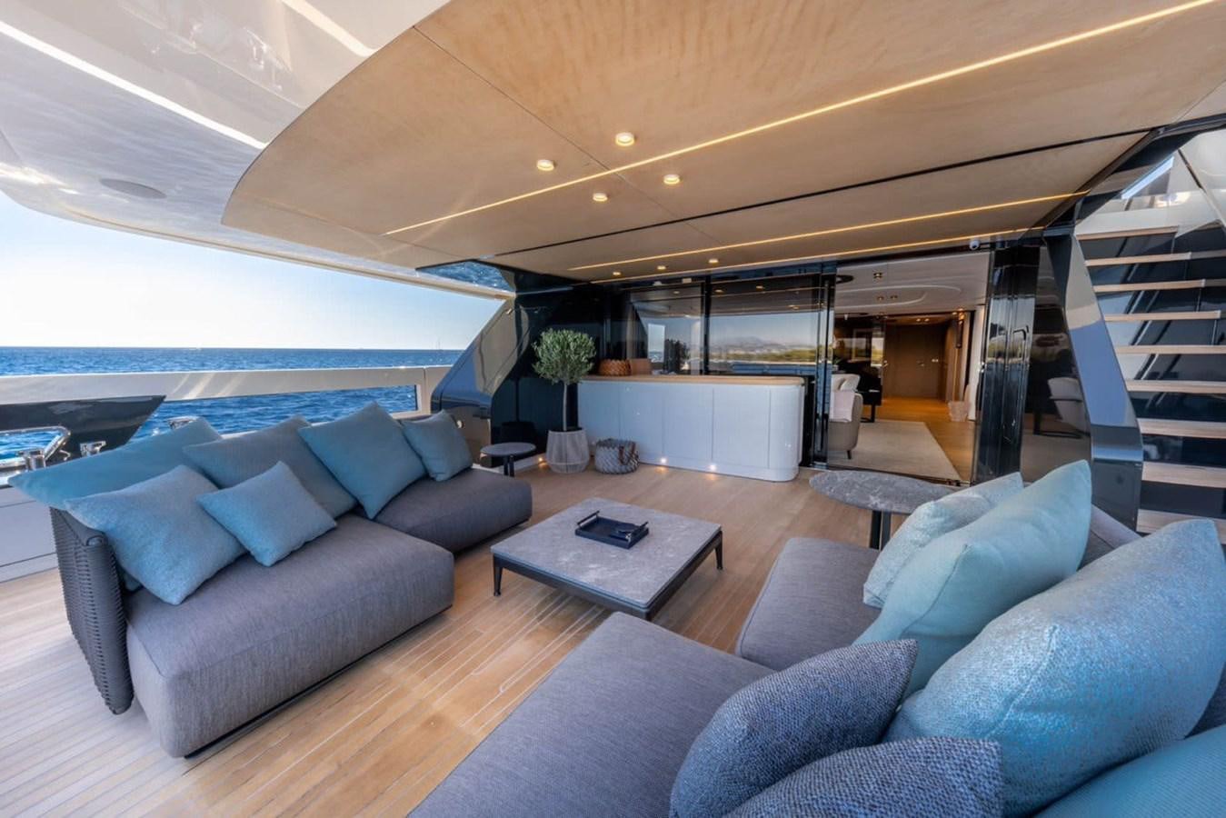 a living room with a large open door aboard UILIA Yacht for Sale