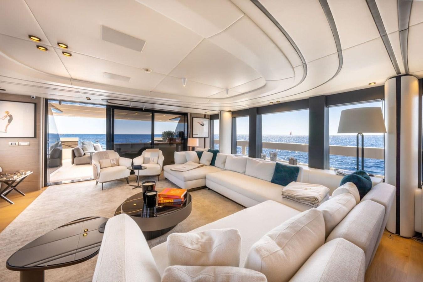a living room with a large window aboard UILIA Yacht for Sale