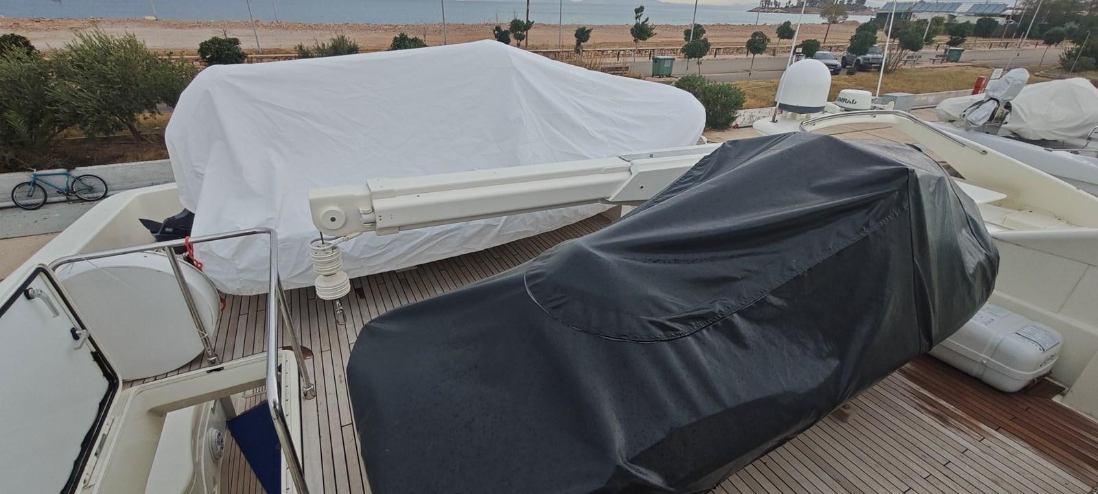 a person lying on a boat aboard MAYBE NOT Yacht for Sale