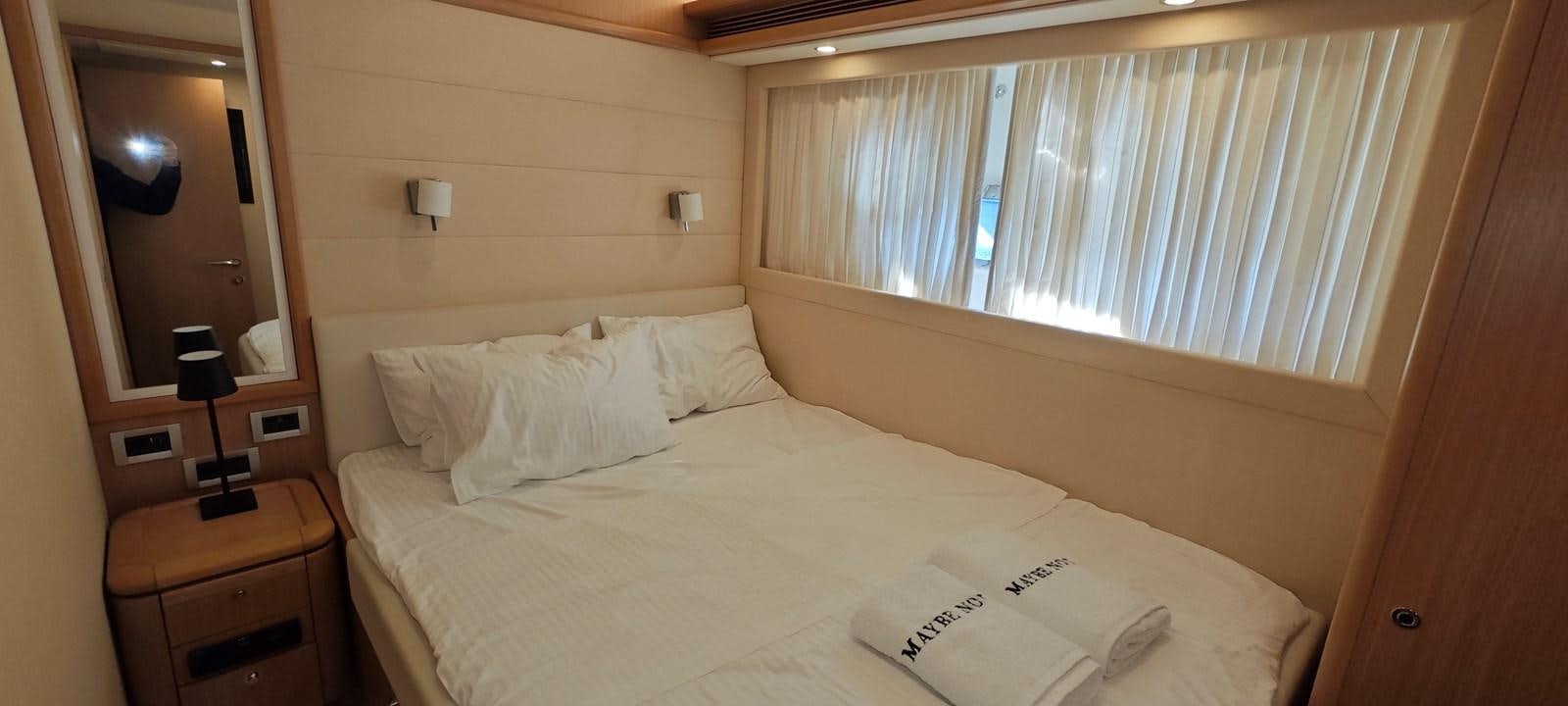a hotel room with a bed aboard MAYBE NOT Yacht for Sale