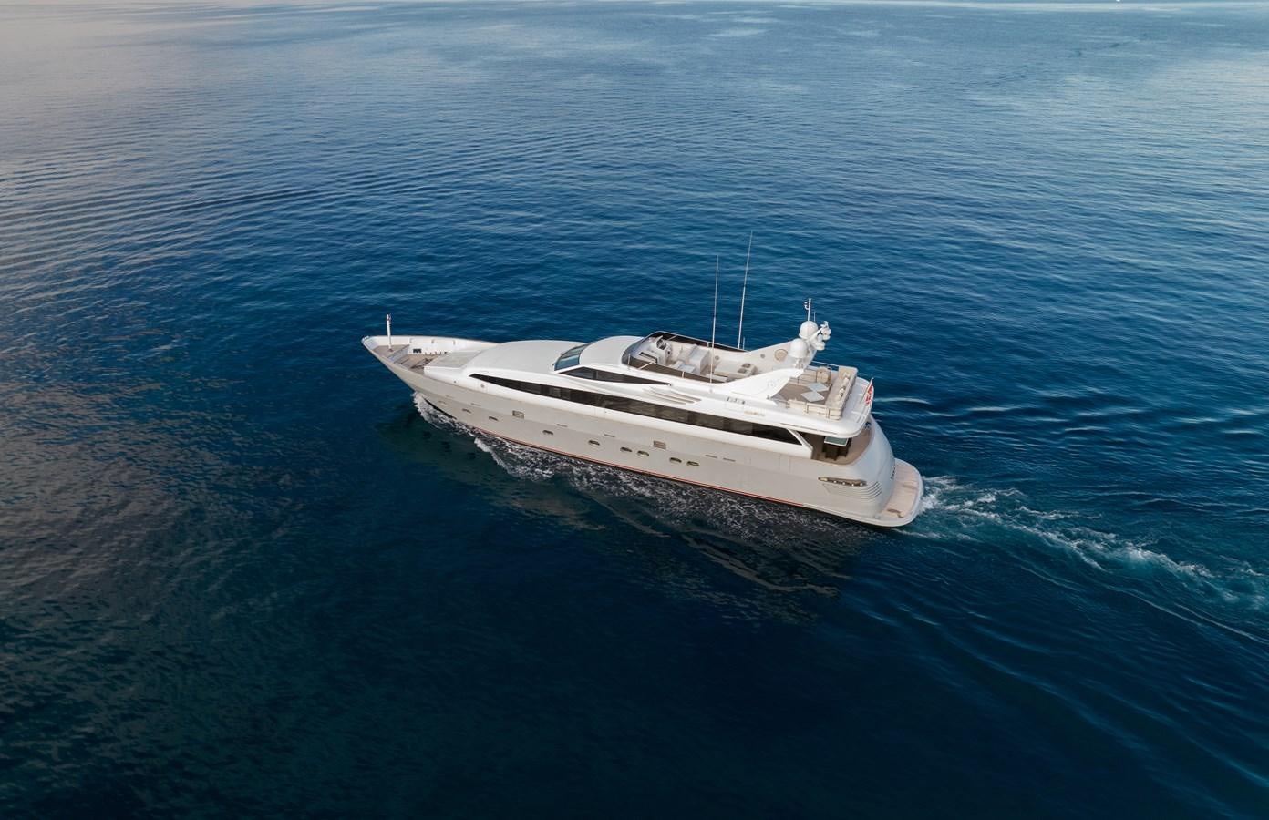 a white boat in the water aboard XANAX Yacht for Sale
