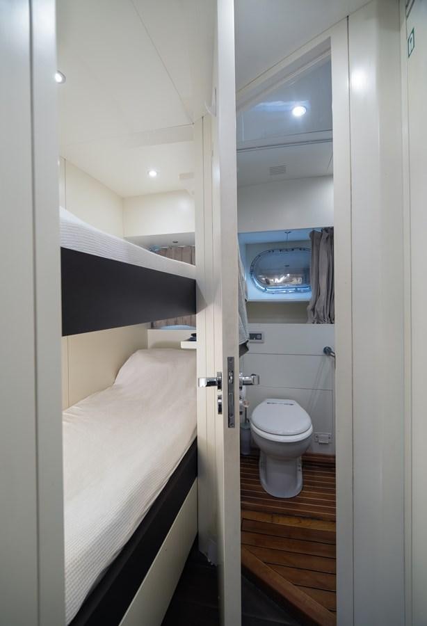 a bathroom with a toilet and a sink aboard XANAX Yacht for Sale