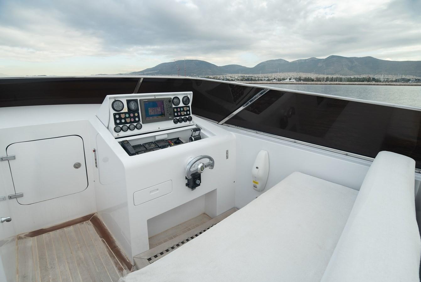 a boat with a screen and buttons aboard XANAX Yacht for Sale