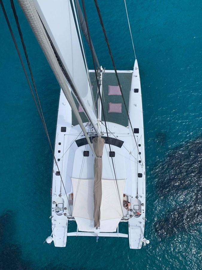 a boat sailing on the sea aboard MAGIC CAT Yacht for Sale