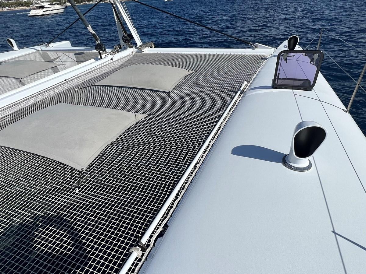 a boat with a solar panel aboard MAGIC CAT Yacht for Sale