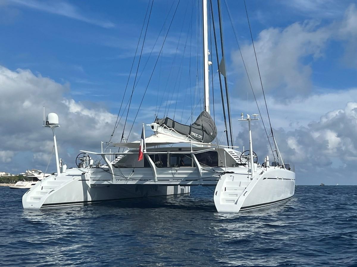 a boat on the water aboard MAGIC CAT Yacht for Sale