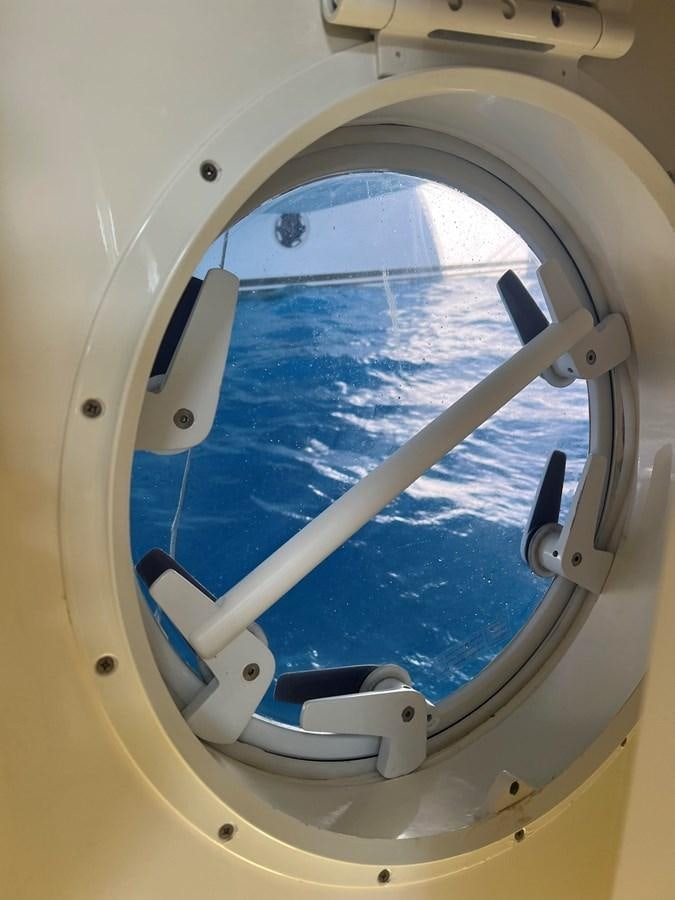 a view of the ocean from the inside of an airplane aboard MAGIC CAT Yacht for Sale