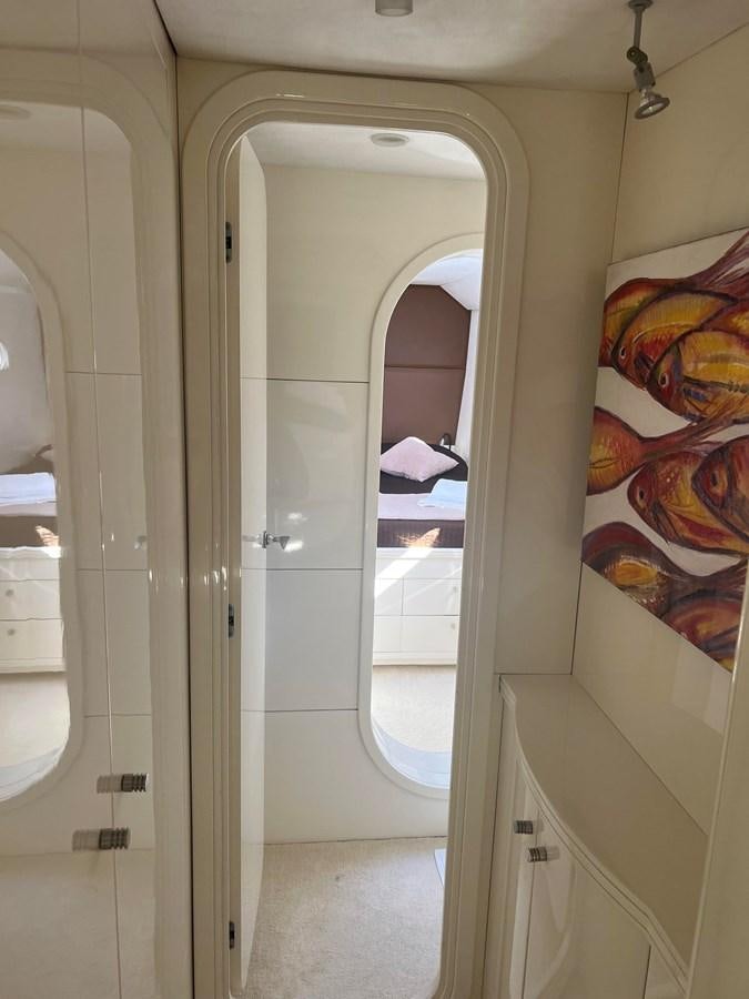 a bathroom with a glass door aboard MAGIC CAT Yacht for Sale