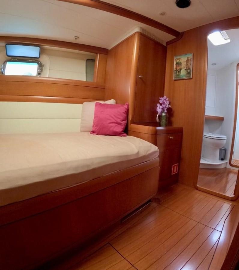 a bed in a room aboard DUNJA Yacht for Sale