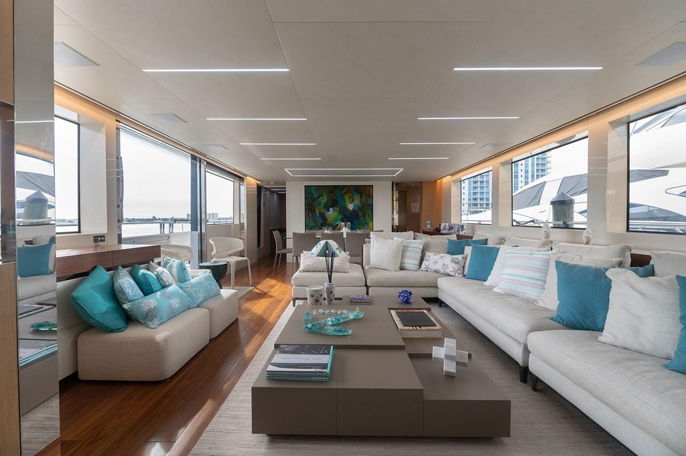 a living room with a couch and a coffee table aboard RYEN Yacht for Sale