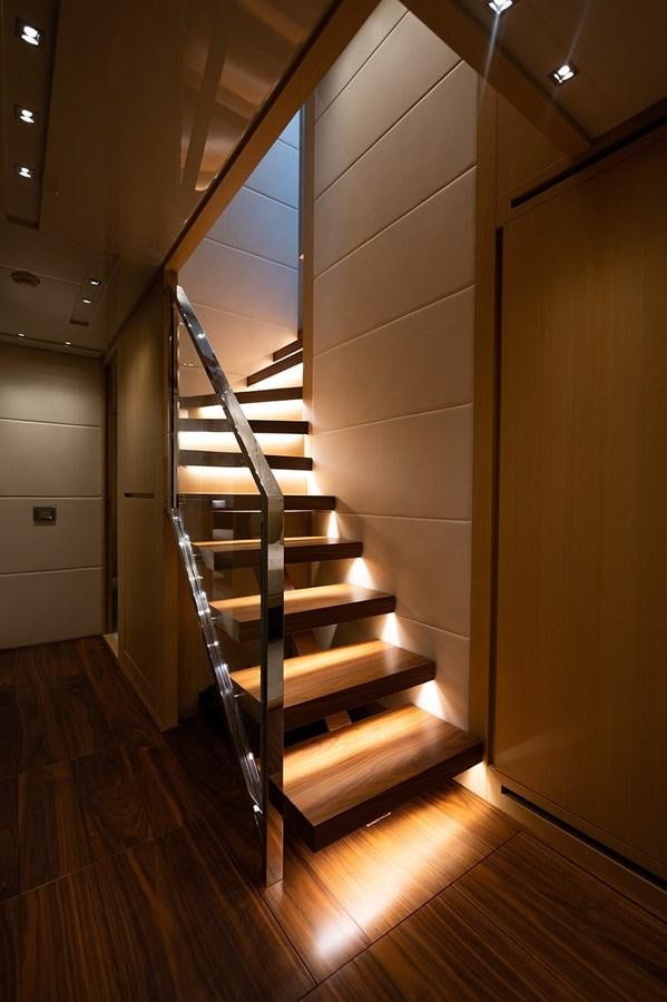 a staircase in a building aboard RYEN Yacht for Sale