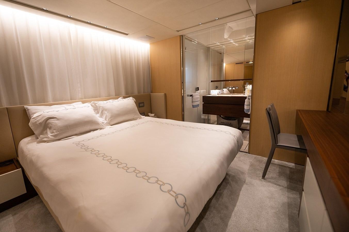 a bed in a room aboard RYEN Yacht for Sale