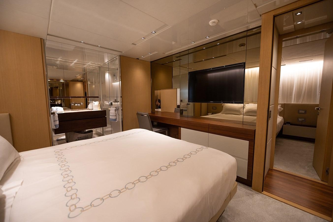 a hotel room with a bed aboard RYEN Yacht for Sale