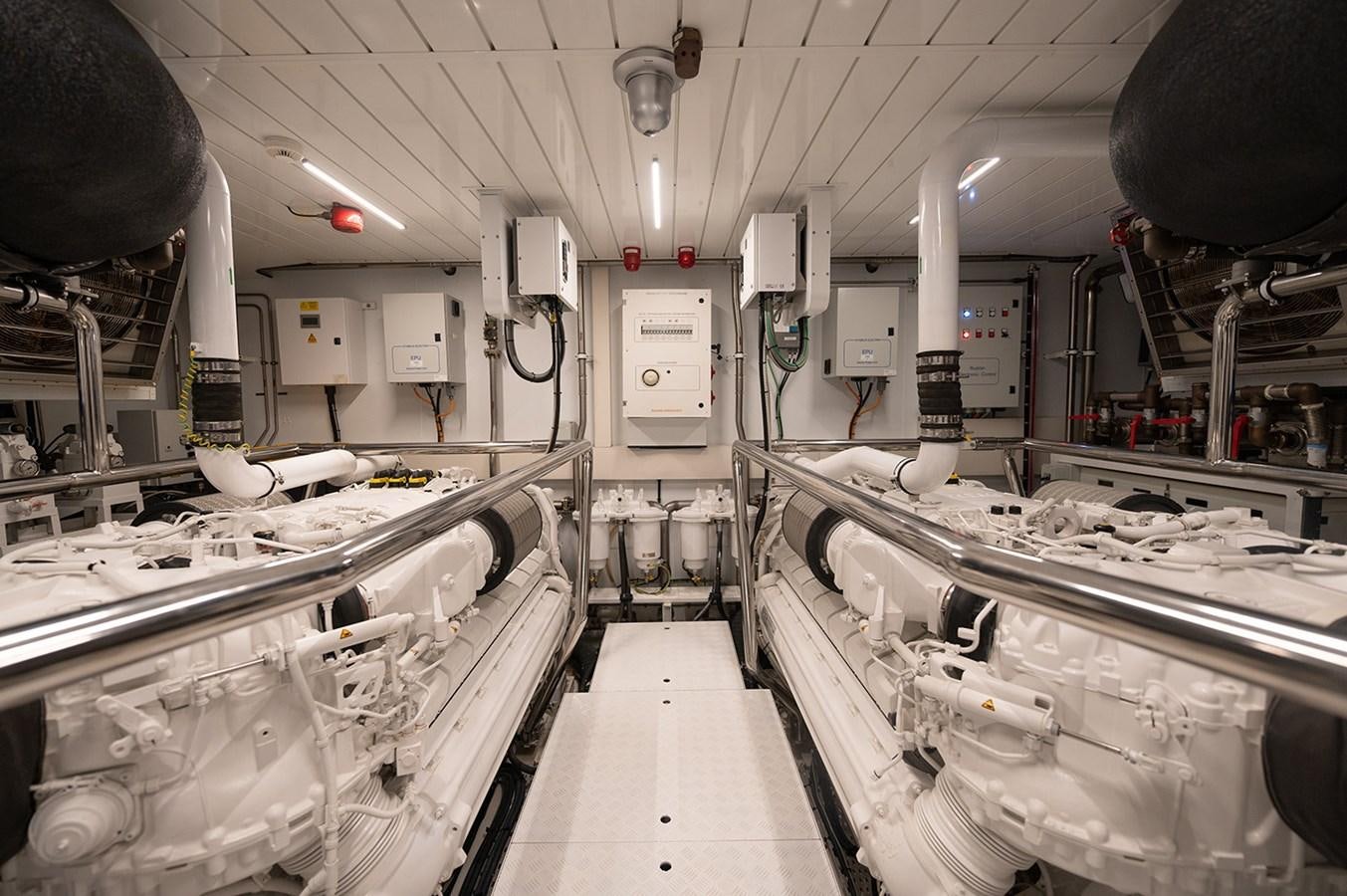 a room with many white machines aboard RYEN Yacht for Sale