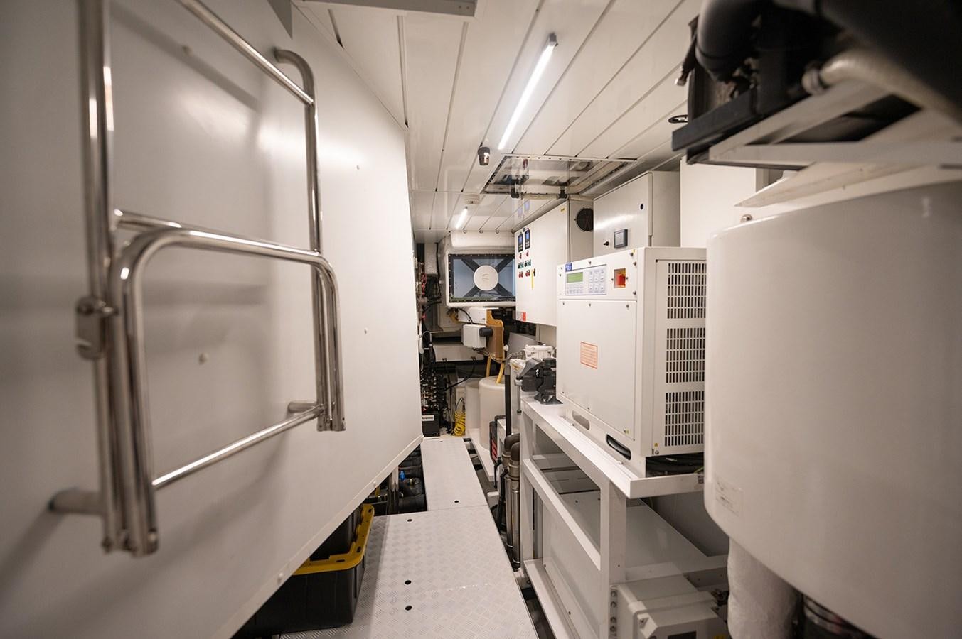 a room with machines and equipment aboard RYEN Yacht for Sale