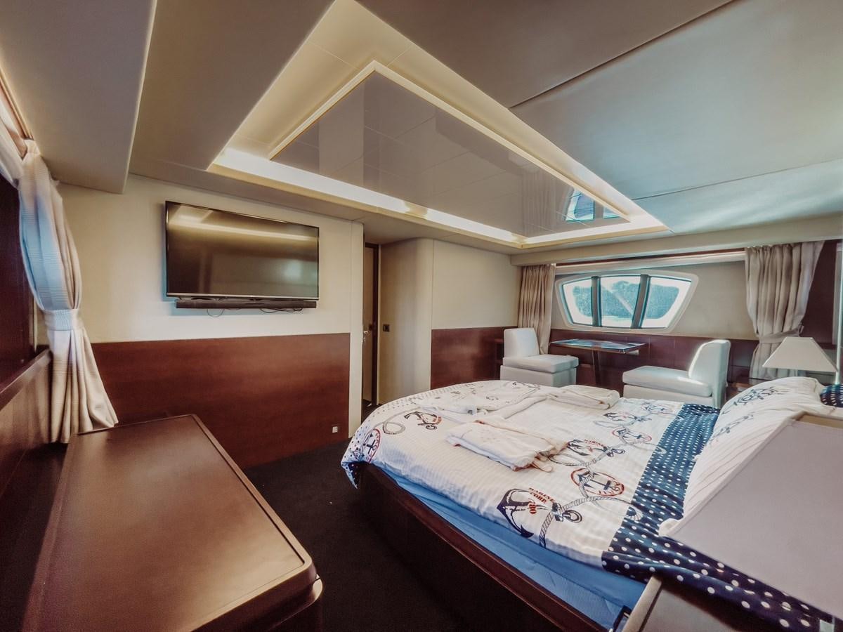 a room with two beds aboard AZIMUT 88 Yacht for Sale