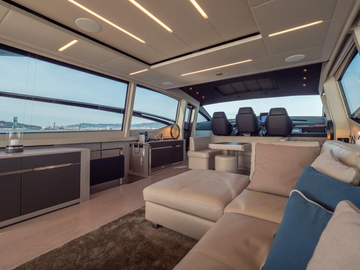 inside of a vehicle with a large window and a view of the water aboard SURVIVOR Yacht for Sale