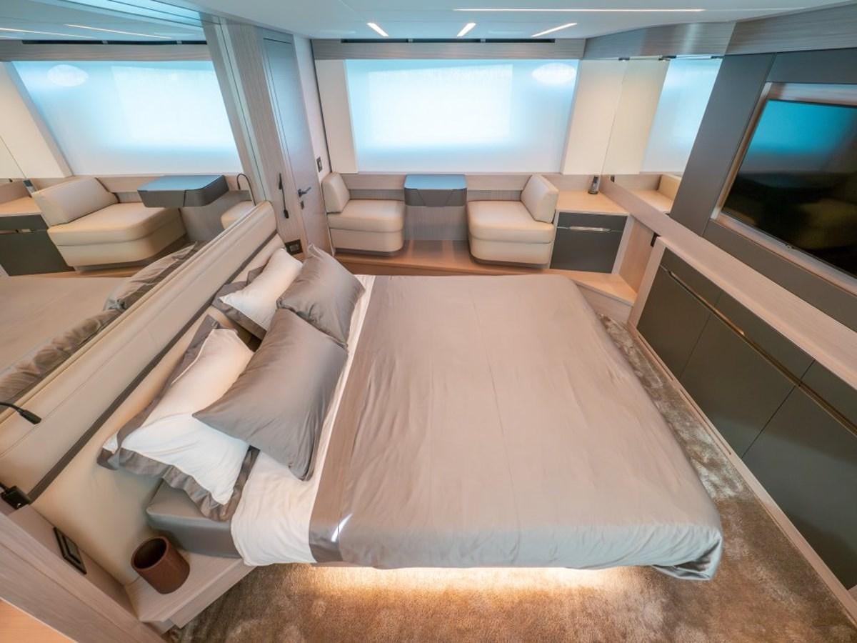 a room with a bed and a tv aboard SURVIVOR Yacht for Sale