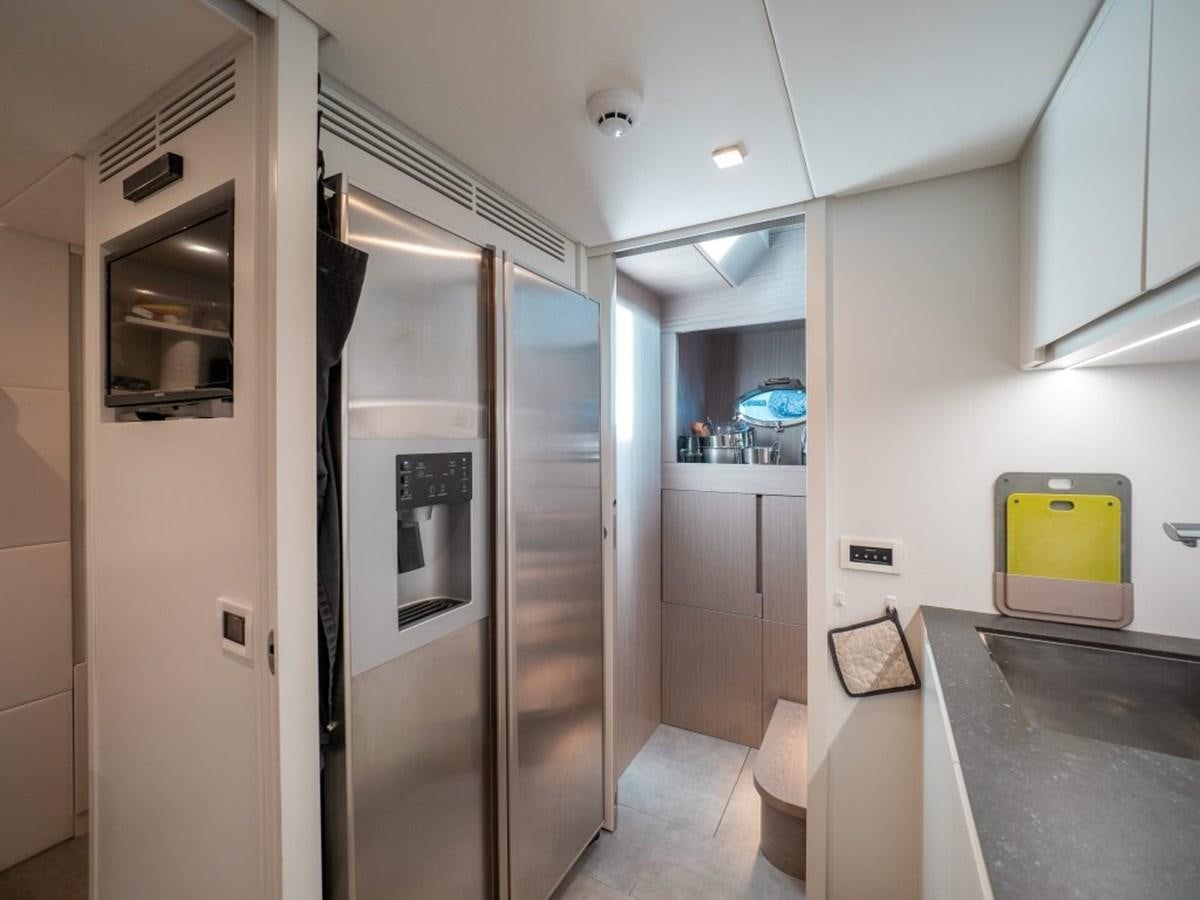a room with a glass door aboard SURVIVOR Yacht for Sale