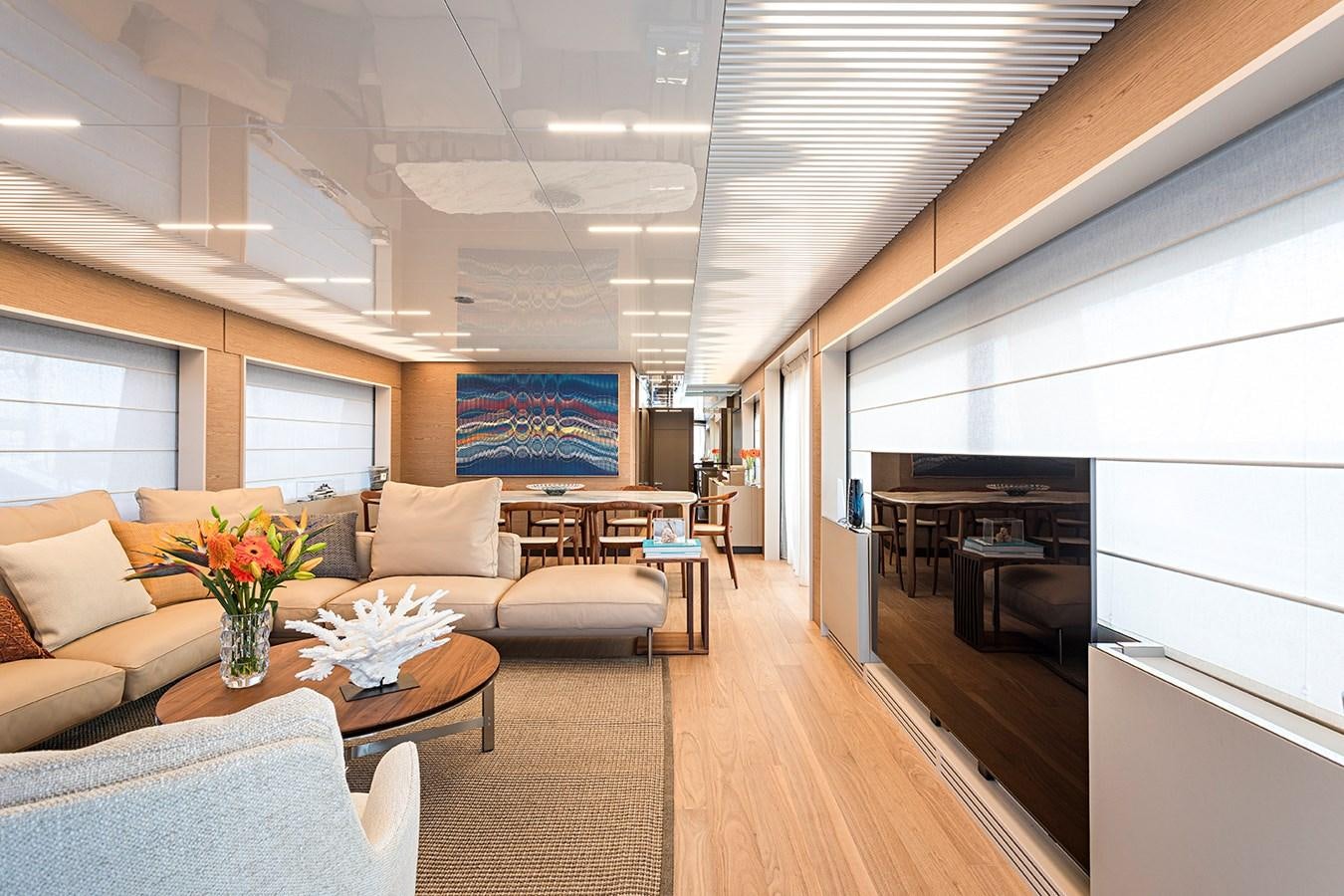 a living room with a piano aboard ANINHA 1 Yacht for Sale